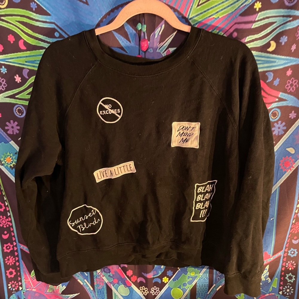 Black patch sweater